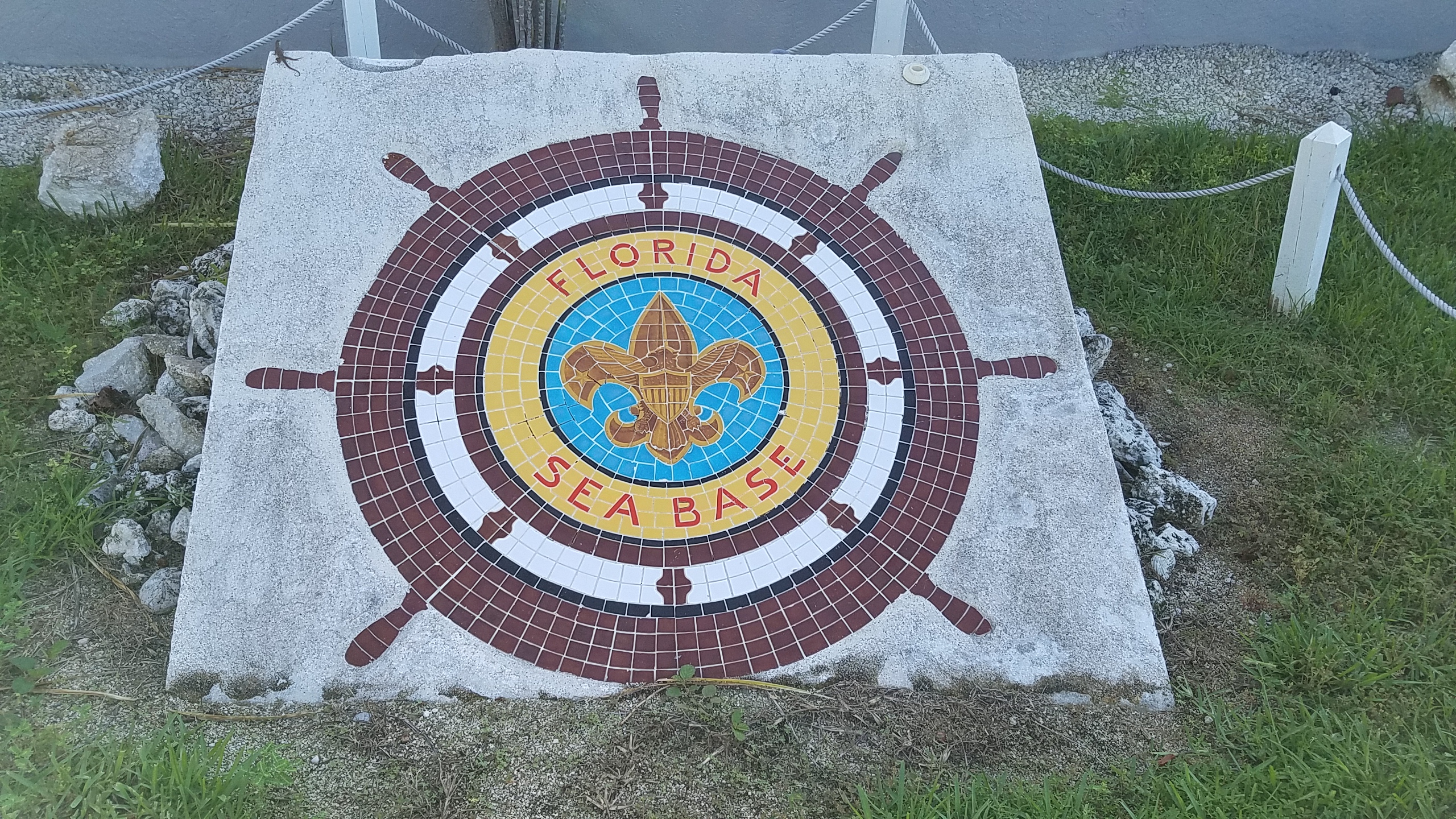 Florida Sea Base mosiac with a wheel and BSA symbol on it